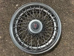 (1) 1982-1986 Pontiac Parisienne 15-INCH Wire Spoke Hubcap, Part# 10037045, Oem. Fixed Price $80.00.