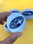 Set Of 4 Subaru Silver Blue Wheel Center Cap, 28821SA030. Fixed Price $25.86.
