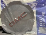 09597973 - Genuine Button Style Center Cap With Gmc Logo. Fixed Price $30.00.