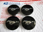 Set Of 4 Genuine Oem 2015-2025 Ford Mustang Black Center Caps P/n FR3C-1A096-AC. Fixed Price $30.00.