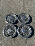 Genuine 1981 To 1987 Oldsmobile Cutlass 14 Inch Wire Spoke Hubcaps. Fixed Price $108.00.