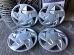 (4) Oem Used 1997-99 14" Mitsubishi Eclipse Hubcaps Wheel Covers #57558 MR761489. Fixed Price $169.00.