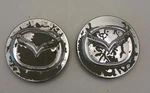 (2) Mazda Center Caps #2114 HC68. Fixed Price $6.00.