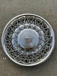 One 75-85 Cadillac Fleetwood Deville 15 Locking Wire Wheel Cover Hubcap. Fixed Price $124.99.