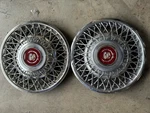 1985-1987 Cadillac Deville Wire Spoke 14 In 2X Hubcap Wheel Cover Red Emblem. Fixed Price $89.99.