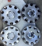 Set 2003-2009 Volkswagen Golf / Rabbit 61544 15" Wheel Cover Oem 1C0-601147-LGJW. Fixed Price $100.00.
