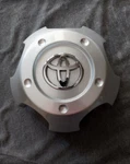 Fits 2003-2007 Landcruiser Silver Wheel Center Hubcap 69479 69435 Used 4PC. Fixed Price $124.95.