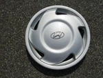 One Genuine 1992 Hyundai Scoupe 14 Inch Hubcap Wheel Cover. Fixed Price $12.32.