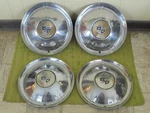 1954 15" Set Of Wheel Covers. Fixed Price $149.95.