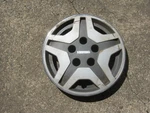 One Genuine 1988 1989 Mazda 626 Hubcap Wheel Cover Scratched. Fixed Price $22.00.