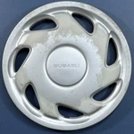 One 1993-1995 Subaru Impreza # 60520 14" 7 Slot Hubcap Wheel Cover 28811FA010. Fixed Price $24.99.