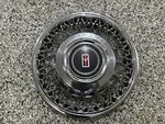 One 14 - 1986 1987 1988 Oldsmobile Delta Wire Spoke Hubcap Wheel Cover 4104B. Fixed Price $45.99.