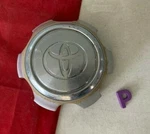 #p (1) 01-02 Toyota Runner Center Cap 10 Spoke 16" Wheel 42611-35180. Fixed Price $17.95.