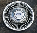 (1) Oem 1987-90 Ford Taurus Wire Spoke 15" Hubcap Wheel Cover P/n E7DC-1000-AA. Fixed Price $34.99.