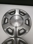 Two 1995-1997 Toyota Tacoma # 61092 14" Slot Metal Hubcap / Wheel Cover. Fixed Price $530.00.