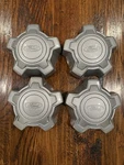 Ford Maverick 2021-2025 Silver Center Caps Set Of 4 NZ6C-1000-A1A Oem. Fixed Price $99.95.