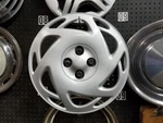 00 01 Saturn Series Sedan Wheel Cover 15 12 Slot 190773. Fixed Price $39.99.