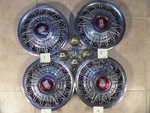 1979-1988 Mercury Marquis Wire Spoke 15" Hubcaps, Lock Brackets, Tool E3AZ1130A. Fixed Price $150.00.