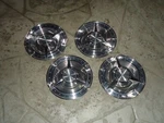 Set Of (4) Oem Gm 1962 Pontiac Bonneville Motor Division Spinner. Fixed Price $225.00.