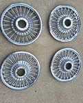 Set Of 1965 1966 1967 Fairlane Mustang 14" Wire Wheel Covers Hub Caps. Fixed Price $175.00.
