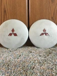 Mitsubishi Eclipse Center Caps MB540180. Fixed Price $70.00.